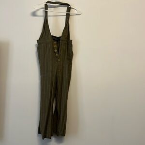 Green and white crisscross overalls